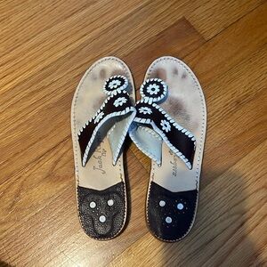 Used jack Roger’s sandals size 9m. Dark chocolate brown and white